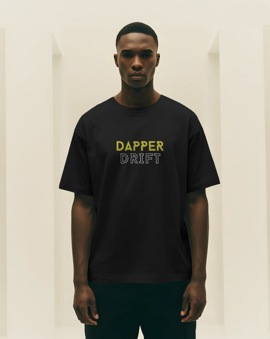 Man wearing a black t-shirt with 'Dapper Drift' text on a plain background